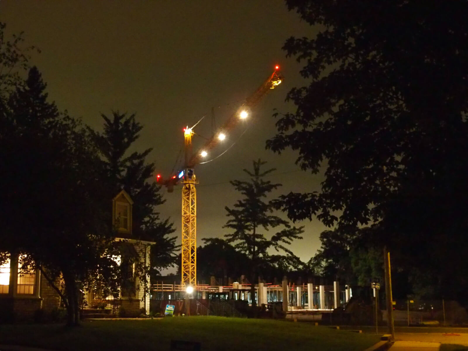 Crane over construction site at night