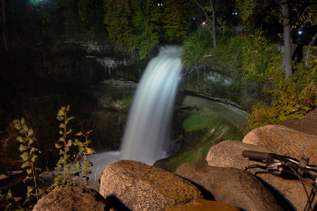 waterfall lit at night