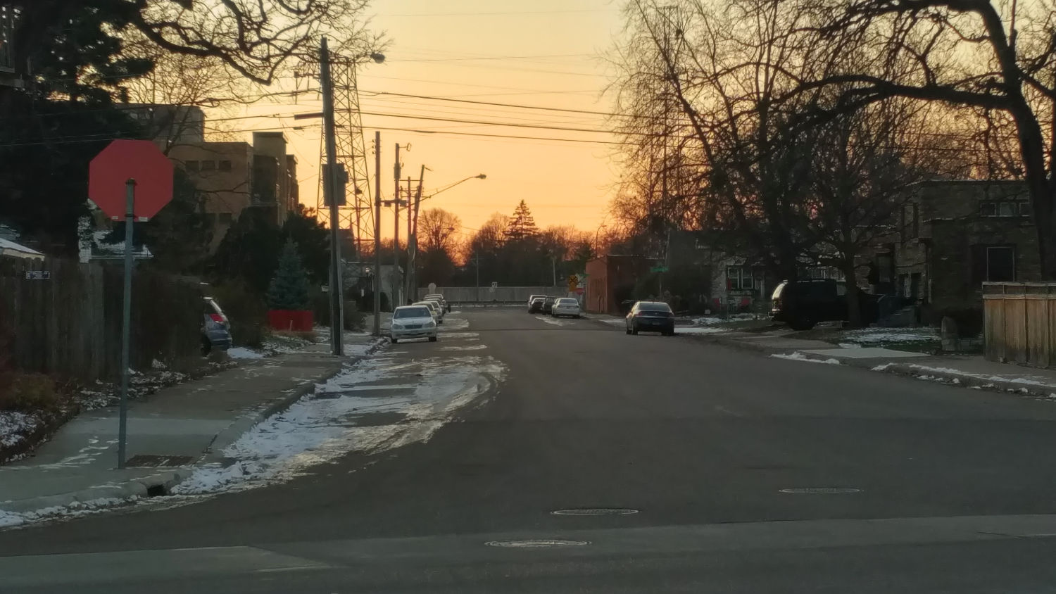 Streetscape with some early ice at sunset