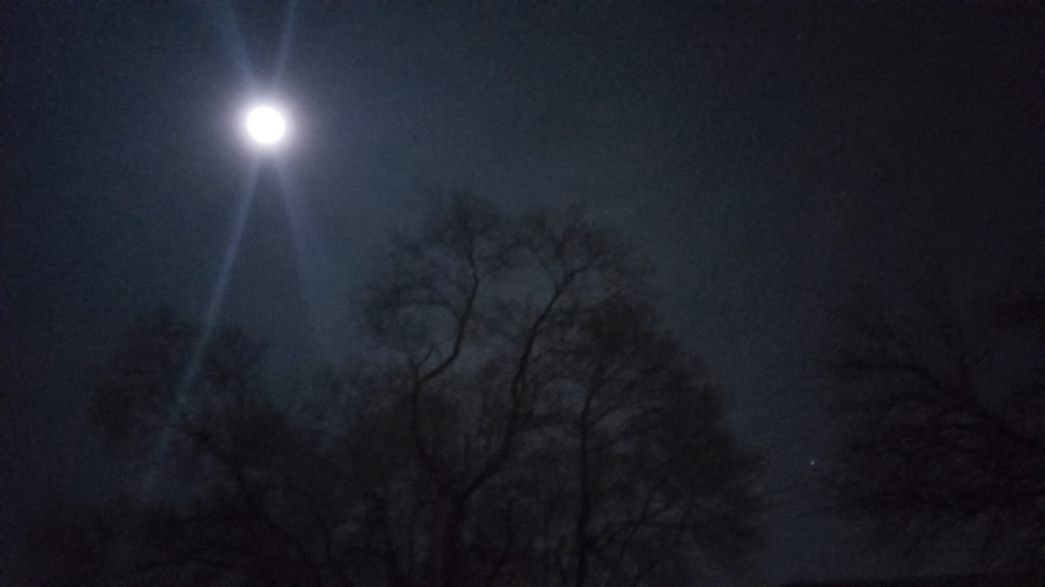 Full Moon in dark sky